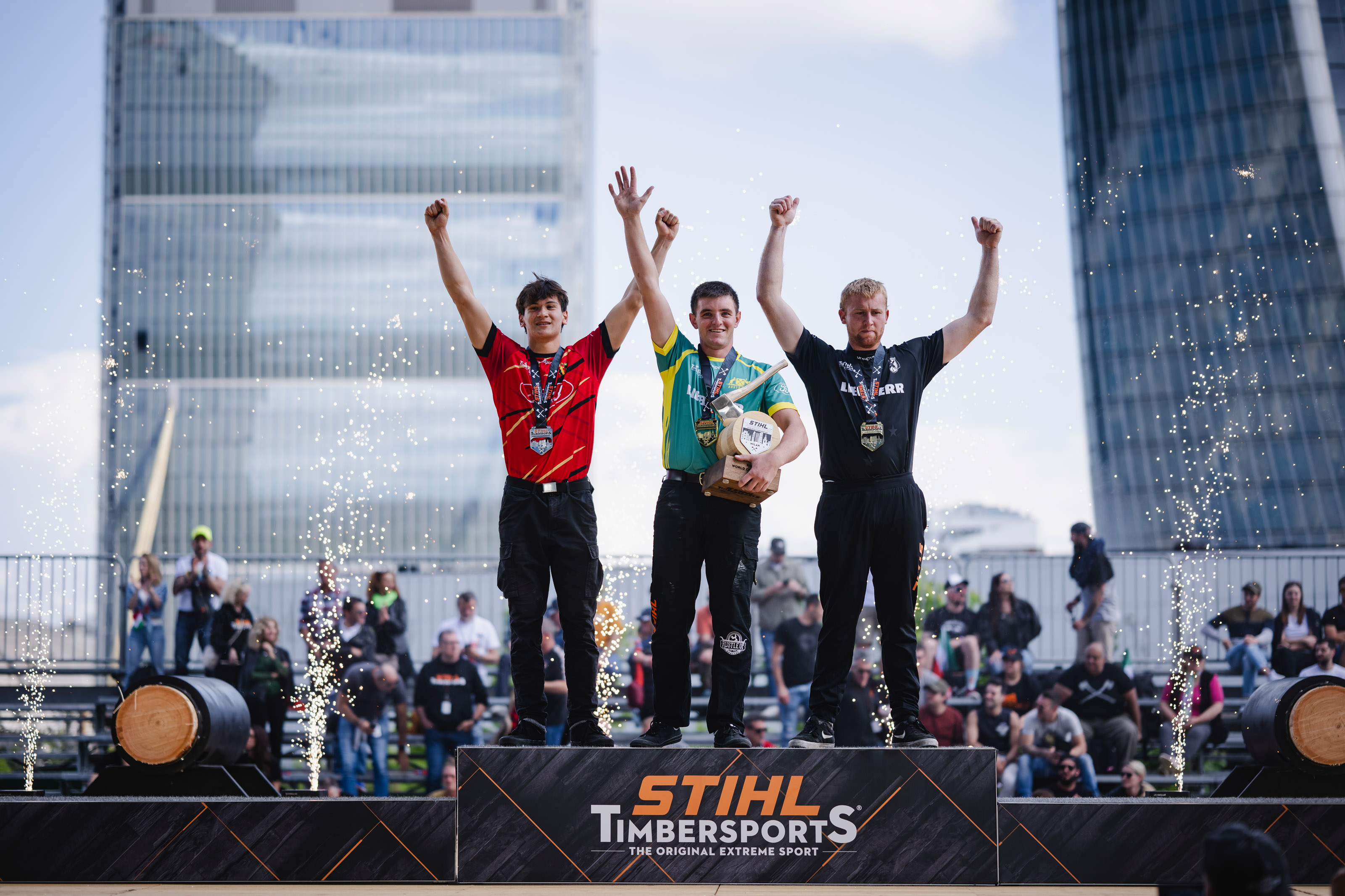 Matt Coffey, Kamiel Van Raemdonck and Cleveland Cherry celebrate their podium finishes at the Rookie World Championship